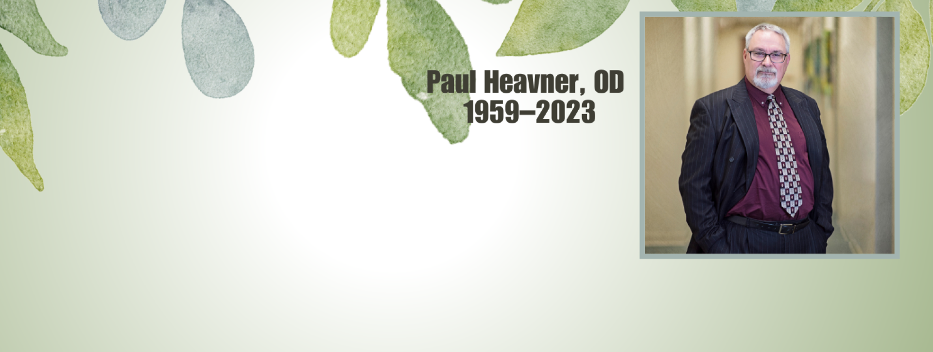 Light green background with leaves and Dr Heavners photo, name and 1959-2023